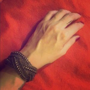 Dark gold flexible beaded bracelet.